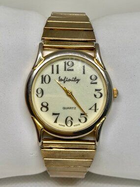 Vintage infinity women’s watch gold tone 30mm quartz analog 6.5” running